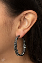 Load image into Gallery viewer, The front facing surface of a chunky gunmetal hoop is dipped in brilliantly sparkling hematite rhinestones while light-catching texture wraps around the back. The interior of the hoop features the opposite pattern, creating the illusion of a full hoop of blinding shimmer. Earring attaches to a standard post fitting. Hoop measures 1 3/4&quot; in diameter.  Sold as one pair of hoop earrings.
