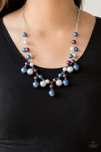 Load image into Gallery viewer, Varying in size, bubbly blue, purple, and silver pearls swing from the bottom of a classic strand of pearls, creating a refined fringe below the collar. Features an adjustable clasp closure.  Sold as one individual necklace. Includes one pair of matching earrings.