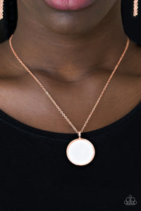 A flat shell-like pendant swings from the bottom of a dainty shiny copper chain below the collar for a refined look. Features an adjustable clasp closure.  Sold as one individual necklace. Includes one pair of matching earrings.