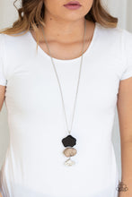 Load image into Gallery viewer, As if chipped off a cliff, pieces of black, brown, and white rock link at the bottom of a lengthened silver chain for an earthy look. As the stone elements in this piece are natural, some color variation is normal. Features an adjustable clasp closure.  Sold as one individual necklace. Includes one pair of matching earrings.