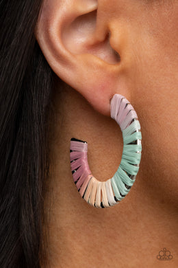 Multicolored wicker-like cording wraps around a thick silver hoop, creating a flirty pop of color. Earring attaches to a standard post fitting. Hoop measures approximately 1 1/2