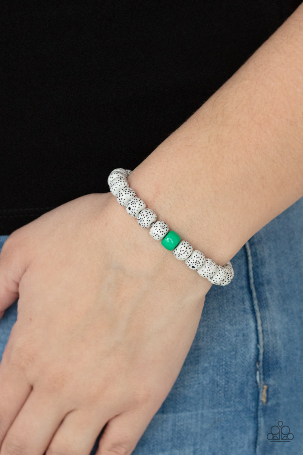 Featuring a refreshing Mint beaded centerpiece, a collection of dotted faux stone beads are threaded along a stretchy band around the wrist for an earthy effect.  Sold as one individual bracelet.