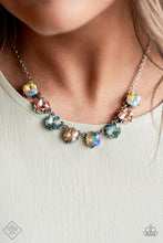 Load image into Gallery viewer, A pretty pastel palette of multicolored rhinestones, set in classic silver pronged fittings, creates sparkle and shine as they dance below the collar. Features an adjustable clasp closure.  Sold as one individual necklace. Includes one pair of matching earrings.  New Kit 