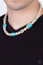 Load image into Gallery viewer, Three generous cylindrical blue stones and small flat stone accents are thoughtfully woven into a macramé style necklace. The natural cord is knotted into a chunky spiral design creating a homespun sensation below the collar. Features a button loop closure.  Sold as one individual necklace.