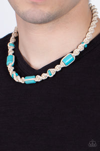 Three generous cylindrical blue stones and small flat stone accents are thoughtfully woven into a macramé style necklace. The natural cord is knotted into a chunky spiral design creating a homespun sensation below the collar. Features a button loop closure.  Sold as one individual necklace.