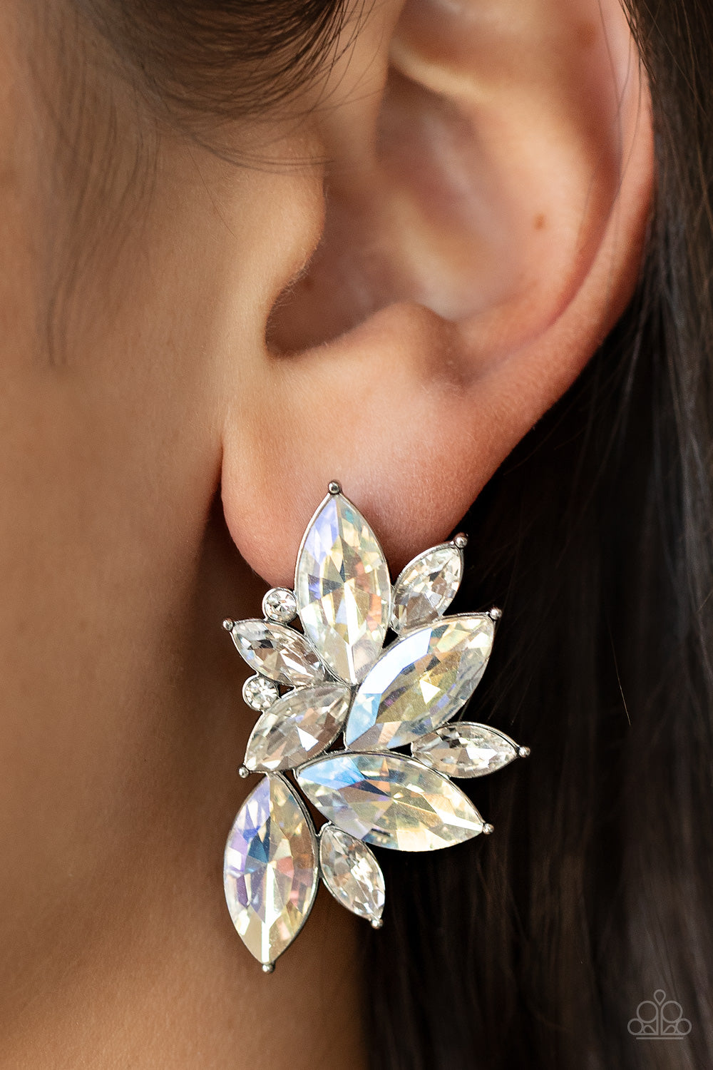 Infused with dainty white rhinestones, a stellar display of iridescent and white marquise cut rhinestones fan out into a spectacular centerpiece. Earring attaches to a standard post fitting.  Sold as one pair of post earrings.