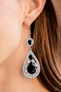 Three teardrop black rhinestones adorn white rhinestone encrusted silver frames that link into an elegant teardrop lure for a flawless fashion. Earring attaches to a standard fishhook fitting.  Sold as one pair of earrings.