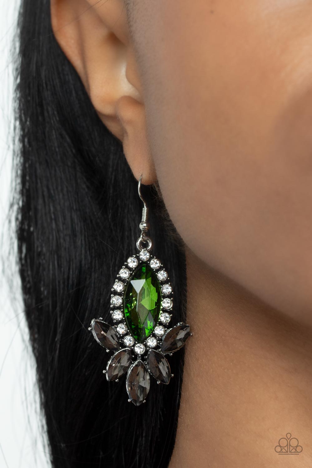 A fan of smoky marquise cut rhinestones flares out from the bottom of an oversized green marquise cut rhinestone that is bordered in dainty white rhinestones, resulting in a dramatically dazzling display. Earring attaches to a standard fishhook fitting.  Sold as one pair of earrings.