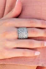 Load image into Gallery viewer, Brimming from edge to edge with a studded texture reminiscent of cobblestone, a wide silver band is bordered in dainty studs resulting in a free-spirited fashion atop the finger. Features a stretchy band for a flexible fit.  Sold as one individual ring.