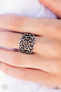 A simple oval frame saturated with wild, swirling silver filigree creates a dreamy centerpiece atop the finger. Features a stretchy band for a flexible fit.  Sold as one individual ring.