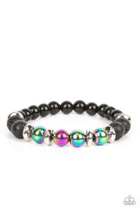 Infused with a section of polished black beads, a stellar assortment of oil spill beads, silver accents, and black lava rock beads are threaded along stretchy bands around the wrist for an urban flair.  Sold as one individual bracelet.