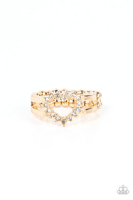 White rhinestone pronged gold fittings coalesce into an airy heart frame atop the center of layered gold frames, resulting in a romantic centerpiece atop the finger. Features a dainty stretchy band for a flexible fit.  Sold as one individual ring.