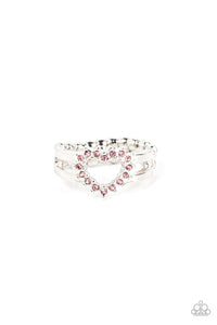 Pink rhinestone pronged silver fittings coalesce into an airy heart frame atop the center of layered silver frames, resulting in a romantic centerpiece atop the finger. Features a dainty stretchy band for a flexible fit.  Sold as one individual ring.
