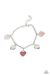 Shiny silver heart charms delicately alternate with white, red, and pink rhinestone encrusted heart frames along a silver chain around the wrist, resulting in a flirtatious fringe. Features an adjustable clasp closure.  Sold as one individual bracelet.